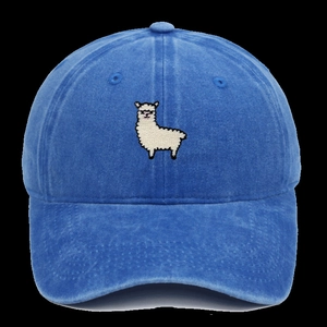 Close-up of sheep embroidery and washed cotton texture on vintage navy dad hat