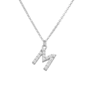 Detail showing letter M pendant with inlaid white pearls on a silver-tone chain