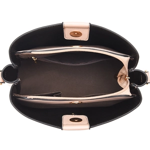 Pink bucket bag interior showing spacious compartments and a central zipper pocket