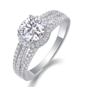 Macro shot of 925 sterling silver halo ring featuring round cut moissanite and pave accents