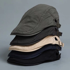 Classic cotton flat caps in olive, grey, khaki, navy, and black with metal side buckles