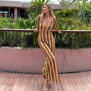 Detail of multi-color zigzag knit texture and deep V-neckline on a slim-fit maxi dress