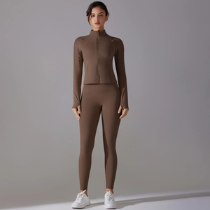 Detail view of mocha brown seamless yoga set with zipper jacket and high waist leggings