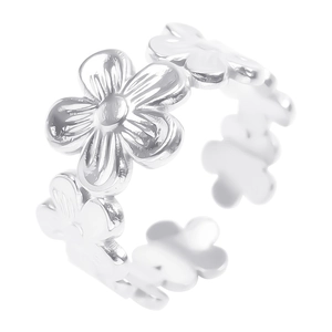 Macro detail of silver adjustable open ring featuring polished five-petal floral patterns