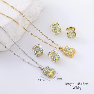 Detailed size specifications for iridescent resin teddy bear necklace and earring set