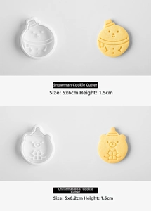 Detail view of snowman and bear cookie cutters with dimensions of 5x6cm and 5x6.2cm