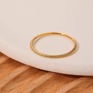 Minimalist 18K gold plated stainless steel ring with matte finish and frosted texture