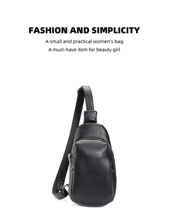 Detail view of smooth black leather waist bag with silver zipper and metallic buckles