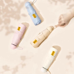 UPF50+ portable capsule sun umbrella in sky blue, pink, apricot and white colors