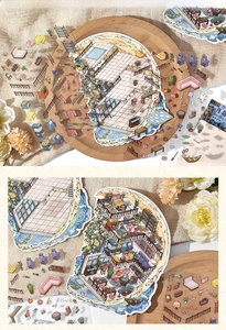 Macro shot of 2.5D miniature house DIY stickers for journals with warm illustrations