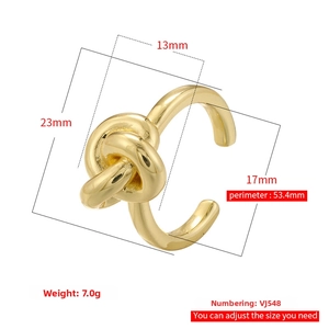Detailed view of the gold-plated knotted drop ring showing its precise 23mm height dimensions