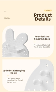 Macro shot of white rabbit pegboard rack showing smooth edges and cylindrical hooks