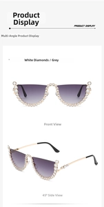 Cat eye rimless sunglasses with rhinestone trim and gradient grey lenses in detail