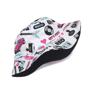 Retro 80s cassette print bucket hat with reversible black brim and music pop art pattern