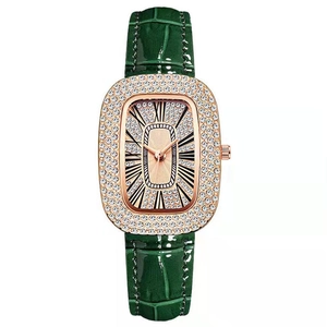 Luxury women's quartz watch with green crocodile leather strap and rhinestone dial