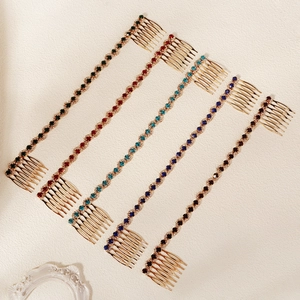 Golden bridal hair combs with colorful rhinestone chains in five various shades