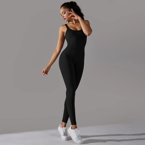 Detail of black seamless ribbed jumpsuit with racerback design for gym and fitness wear