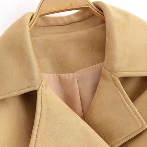 Chic camel faux suede double-breasted short trench coat with lapel on wooden hanger