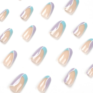 French tip press-on nails with blue and purple wave patterns on a nude pink base