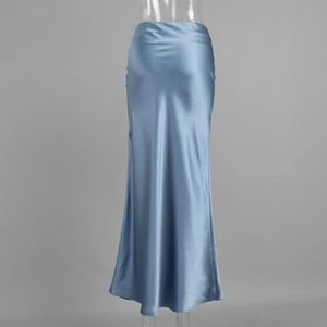Close-up of elegant blue satin maxi skirt showing high-gloss silk texture and drape