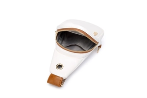 Interior detail of white crossbody bag with grey herringbone lining and gold metal zipper
