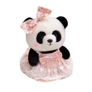 Cute panda plush toy in pink floral princess dress and lace trim on white background