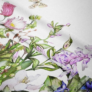 Detail of soft fabric tapestry with realistic floral, leaf, and butterfly prints