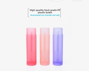 Close-up of 5g refillable PP plastic lip balm tubes with rotating bottom in various colors