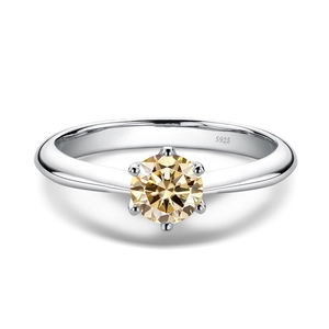 Classic S925 sterling silver ring featuring a round champagne moissanite in a 6-prong crown setting