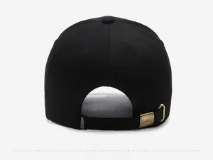 Detail of black cotton baseball cap back with adjustable strap and metallic buckle