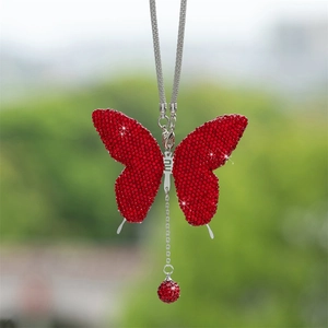 Detailed view of red crystal butterfly car hanging ornament with sparkling rhinestones