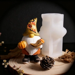 Harvest gnome silicone mold for DIY candles featuring maple leaves and pumpkins