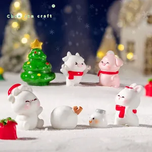 Miniature Christmas resin figurines set featuring snowmen and pigs for DIY winter landscapes