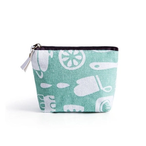 Mint green canvas coin purse with white kitchen patterns and brown zipper closure