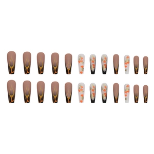 Long ballet press-on nails with autumn maple leaf and orange flame design on white background