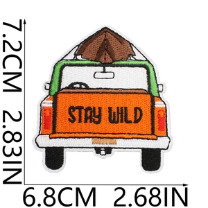 Detail of embroidered camper patch with Stay Wild text and precise dimension markers