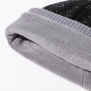 Warm winter knit beanie for kids with thick fleece lining and reindeer design