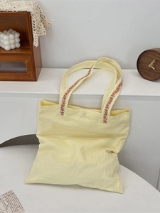 Sac fourre-tout en toile jaune pâle avec sangles fleuries orange pour les cours