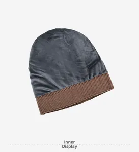 Winter knit hat interior view with smooth grey satin lining and ribbed knit cuff details