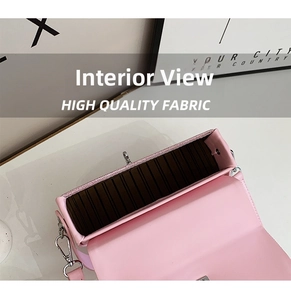 Macro view of light pink leather bag with striped fabric lining and silver metal clasp