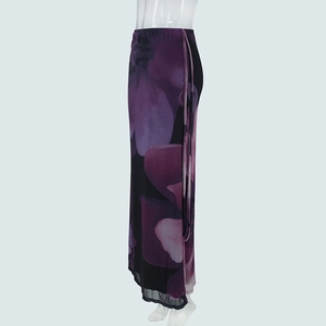 Detail view of purple floral mesh skirt with drawstring side ties and artistic print