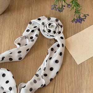 Elegant vintage white fabric scarf necklace with black polka dots and decorative flower