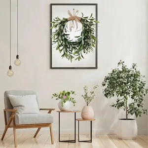 Artificial olive leaf wreath with black fruit and burlap bow for Christmas wall decor