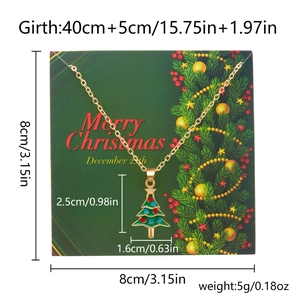 Detail of Christmas tree necklace with green enamel on Merry Christmas card with dimensions