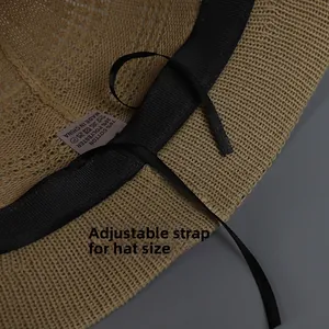 Detail of adjustable black drawstring and knit texture inside the khaki sun hat