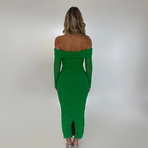 Detail of green off-shoulder mesh dress showing ruched texture and back slit design