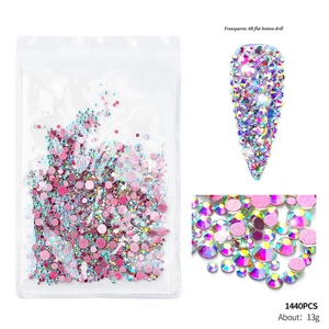 Detail view of transparent AB flat bottom nail rhinestones in 1440pcs bag