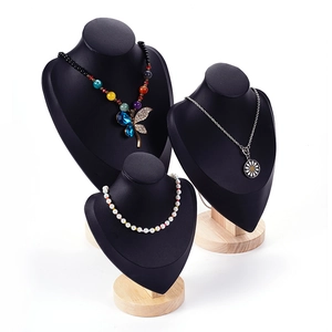 Elegant black portrait necklace display stands with wooden bases for jewelry stores