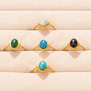 Adjustable 304 stainless steel rings set with colorful oval gemstones in a velvet box