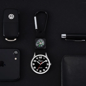 Detailed view of black nylon nurse fob watch with compass and carabiner clip